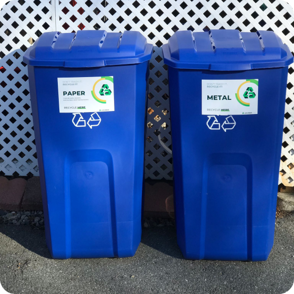 Blue recycling bins designated for paper and metal