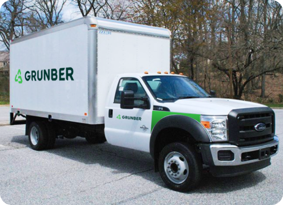 Grunber junk removal truck ready for waste disposal services.